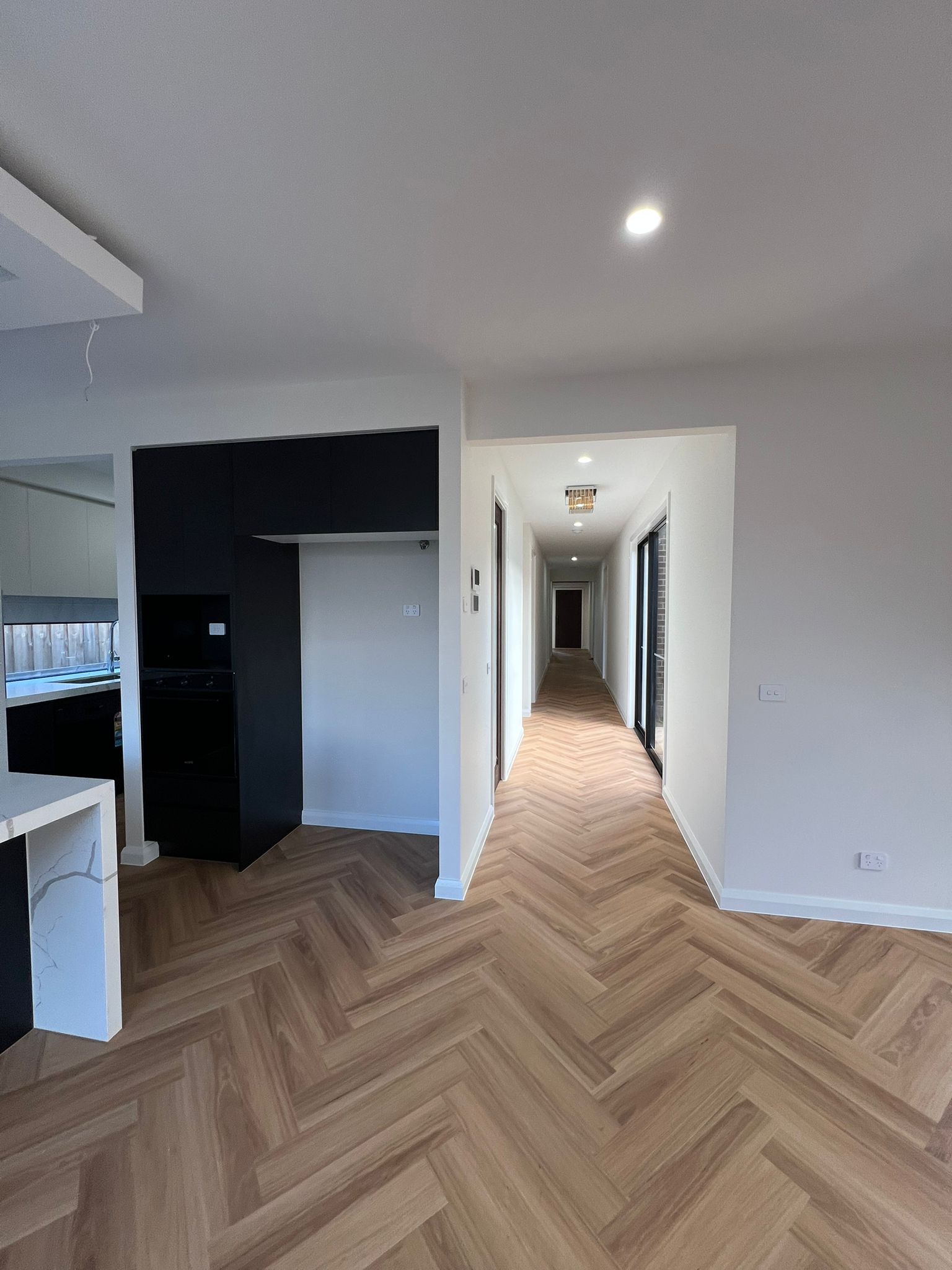 Hallway and living area at Lynwood St Manor Lakes project by Keshar Constructions
